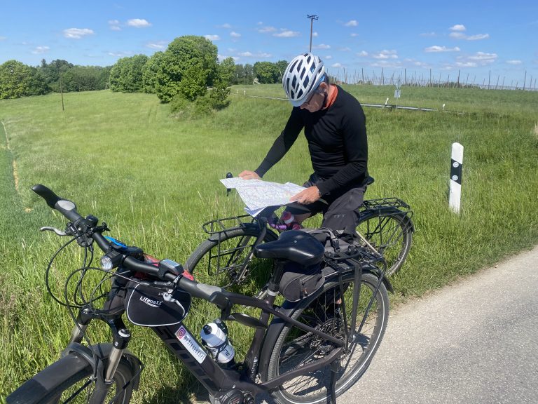 Pete reading map, where are we? Bike, Pete